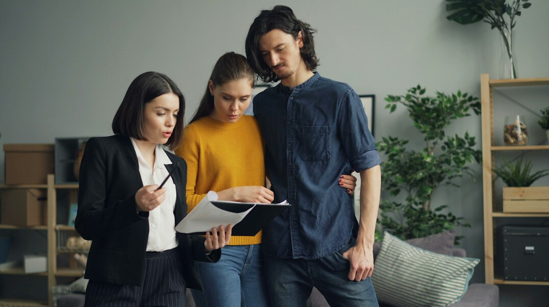 real estate agent showing property