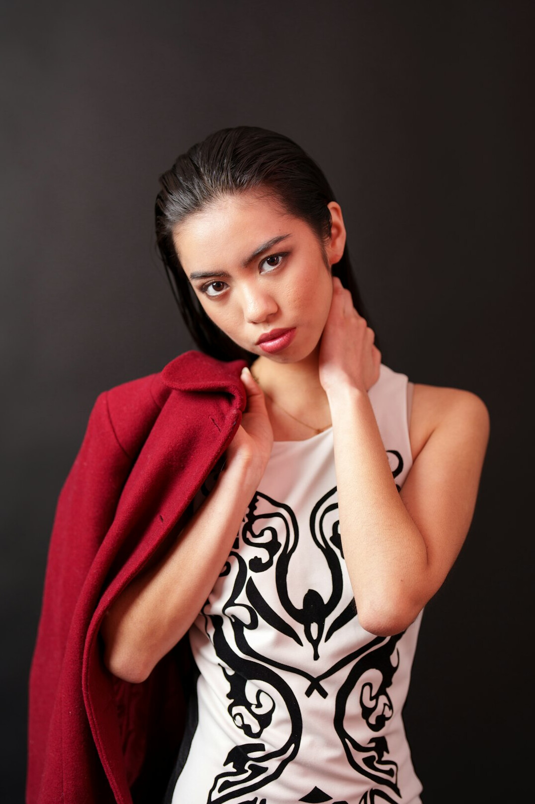 Studio portrait of a confident South American businesswoman in her forties
